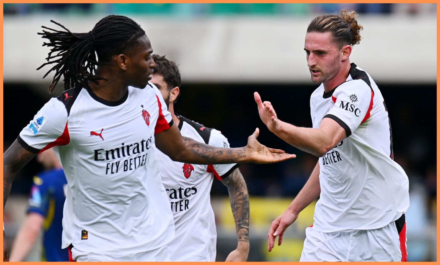 Rafael Leao celebrates with AC Milan teammate Adrien Rabiot