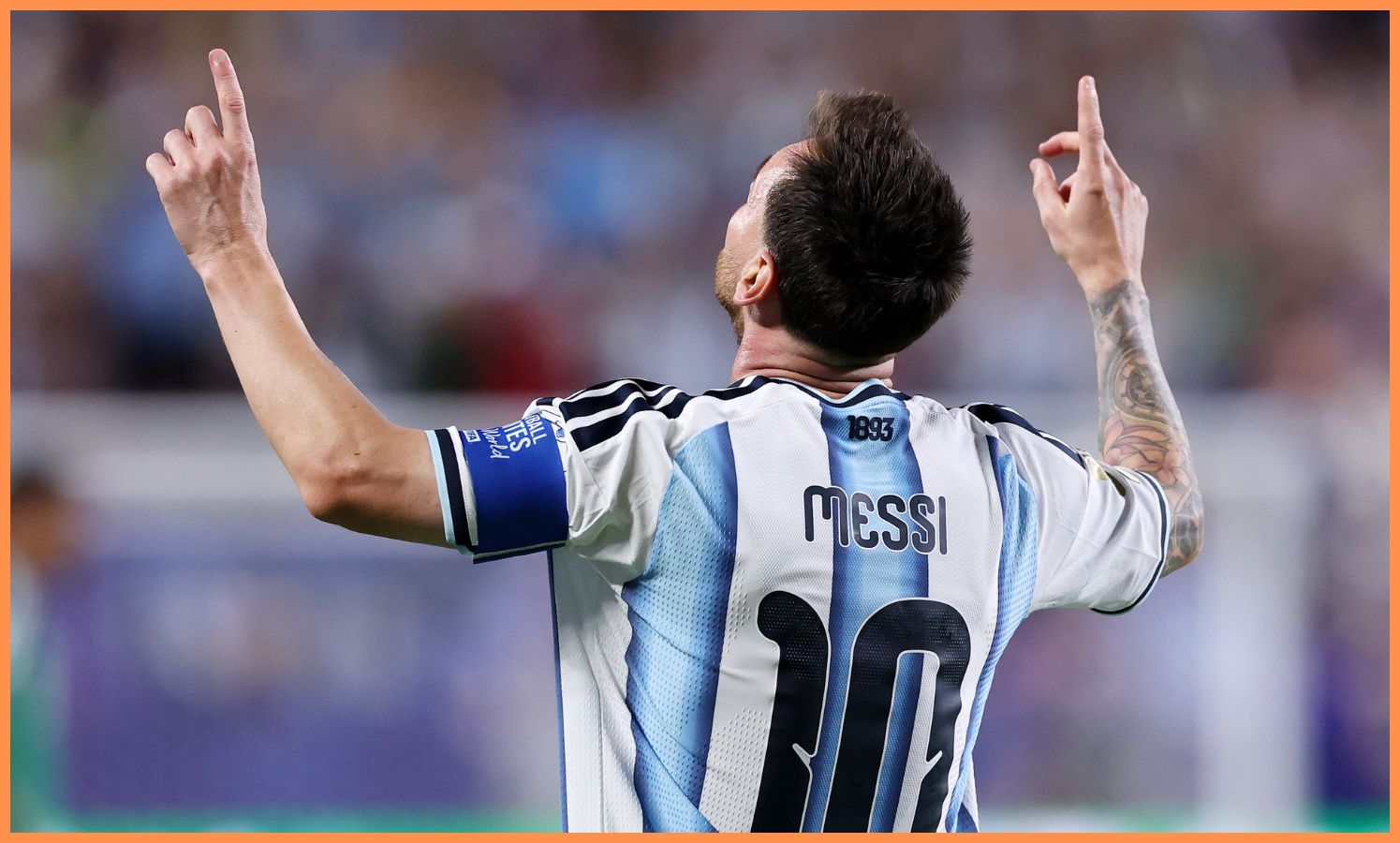 Lionel Messi celebrates scoring for Argentina against Algeria