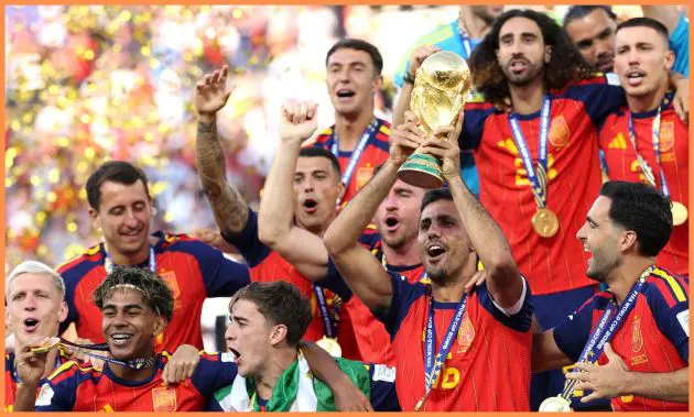 Spain players celebrate lifting the World Cup trophy