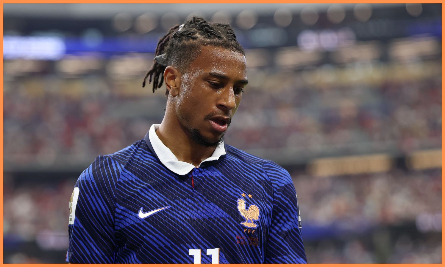 Michael Olise looks on during France's World Cup semi-final defeat
