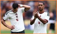 Youri Tielemans applauds the Manchester United fans