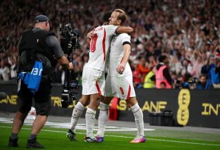 Jude Bellingham celebrates with Harry Kane
